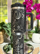 40oz black stainless steel tumbler with handle, laser engraved with Halloween ghost doodles, skulls, gravestones, and stars – ready to ship.