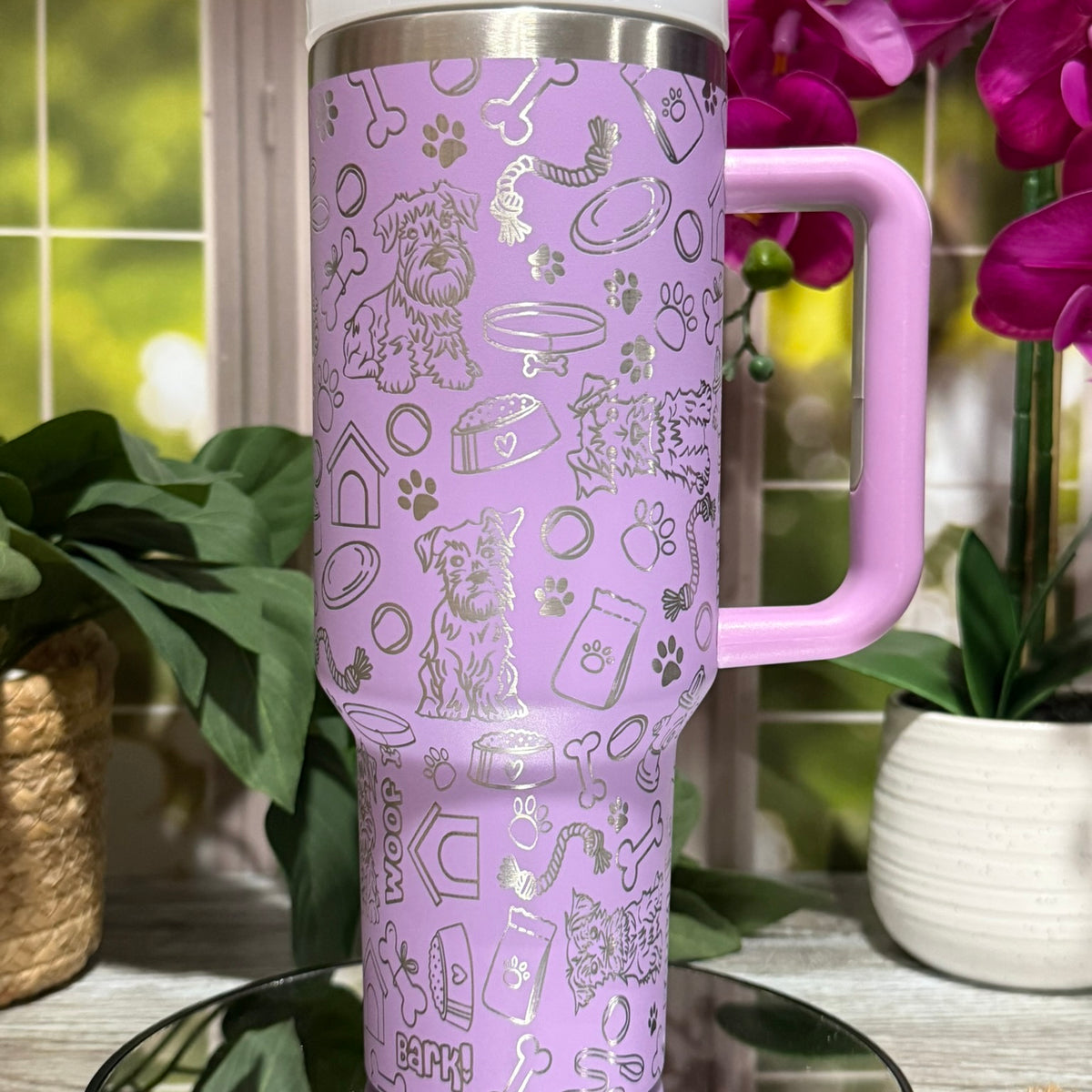 40oz lilac stainless steel tumbler cup with handle, laser engraved with schnauzer doodles, paw prints, and bones – ready to ship.