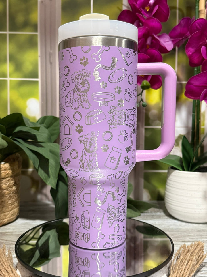 40oz lilac stainless steel tumbler cup with handle, laser engraved with schnauzer doodles, paw prints, and bones – ready to ship.