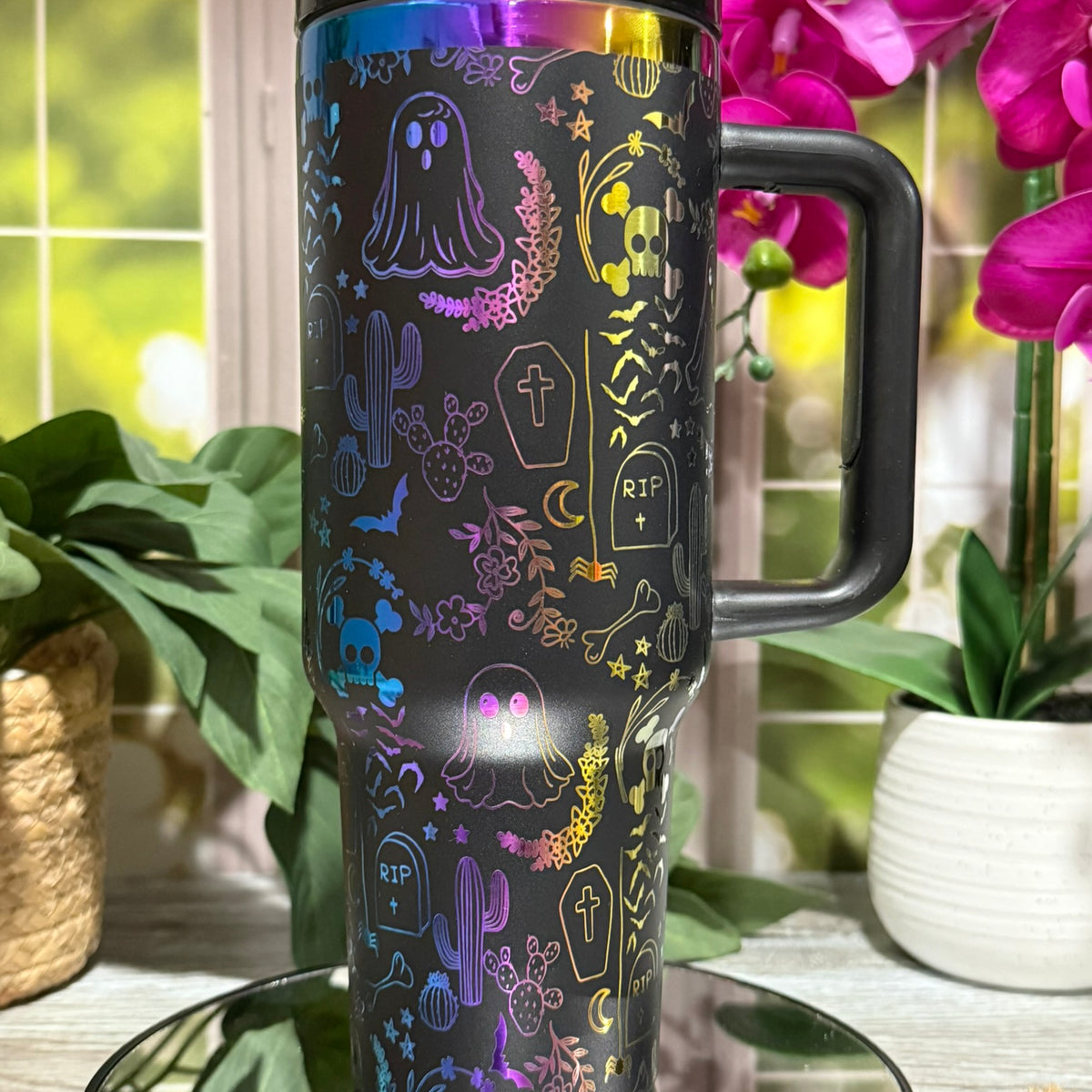 40oz black rainbow stainless steel tumbler cup with handle, laser engraved with Halloween ghost doodles, skulls, bats, and gravestones – ready to ship.