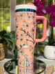 40oz peach rainbow stainless steel tumbler cup with handle, laser engraved with cherry blossom Sakura blooms floral design – ready to ship.