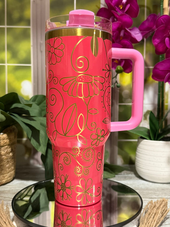 40oz procession pink stainless steel tumbler cup with handle, laser engraved with Spring Swirl floral and swirl design in gold finish – ready to ship.