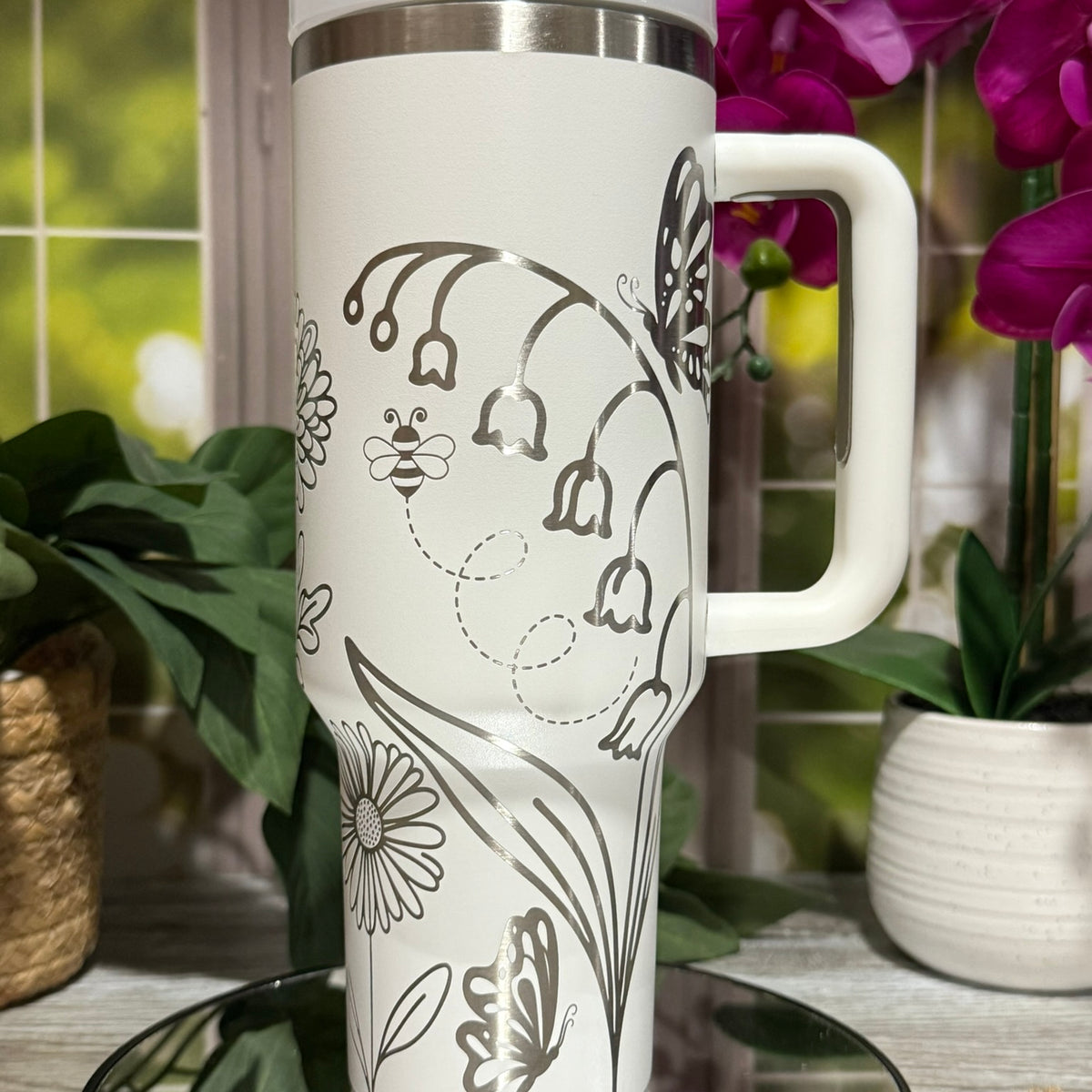 40oz white stainless steel tumbler cup with handle, laser engraved with flowers, bees, and butterflies spring design – ready to ship.