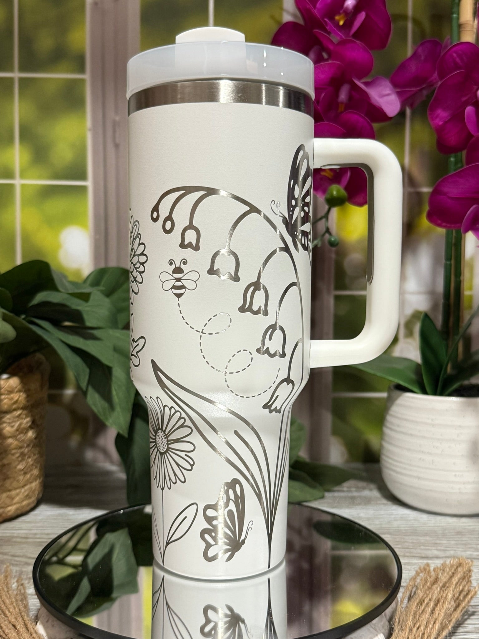 40oz white stainless steel tumbler cup with handle, laser engraved with flowers, bees, and butterflies spring design – ready to ship.