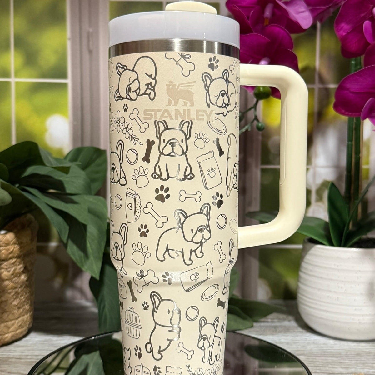 30oz Stanley Cream tumbler cup with handle, laser engraved with French Bulldog doodles, paw prints, and bones – ready to ship.