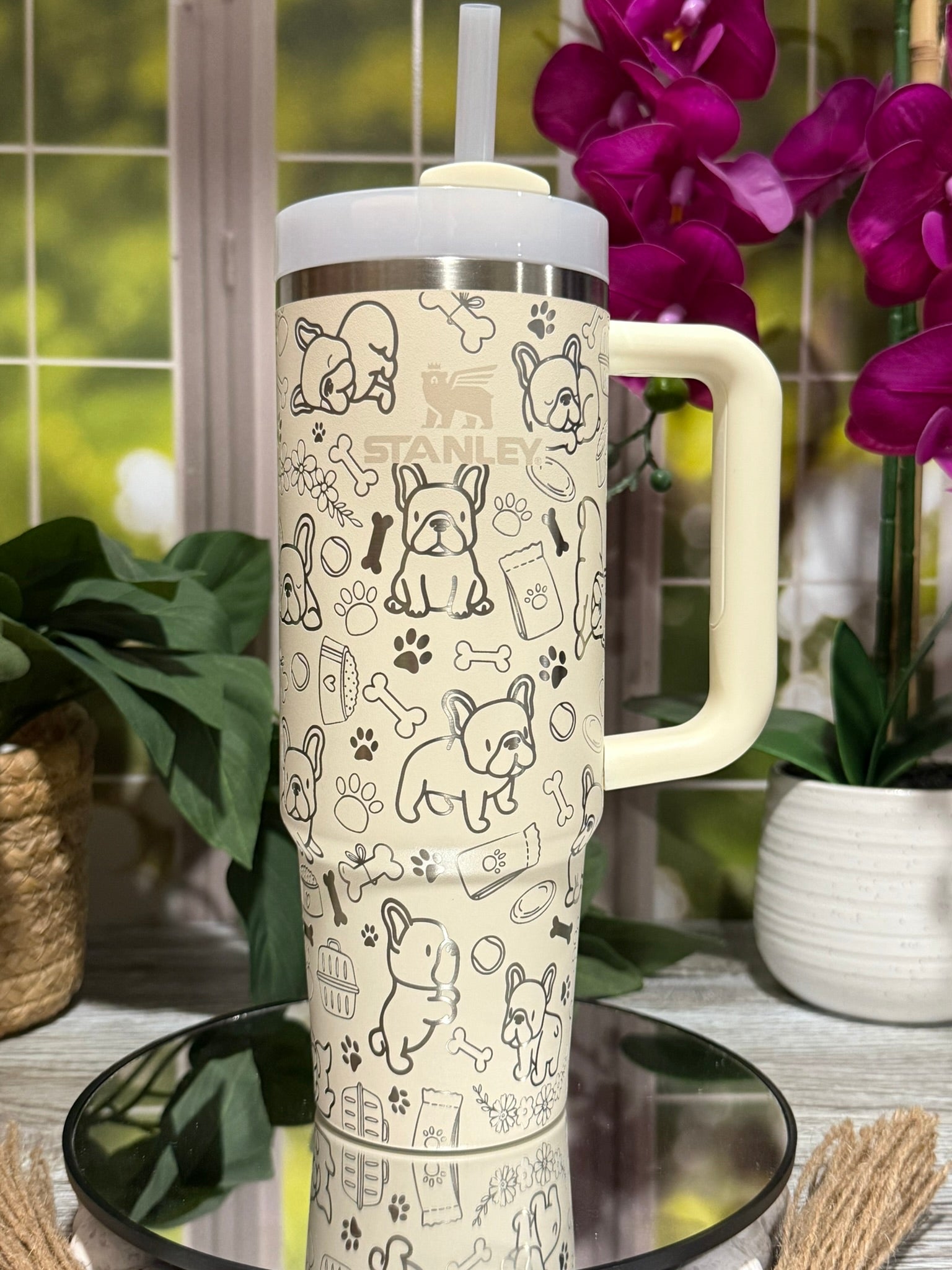 30oz Stanley Cream tumbler cup with handle, laser engraved with French Bulldog doodles, paw prints, and bones – ready to ship.