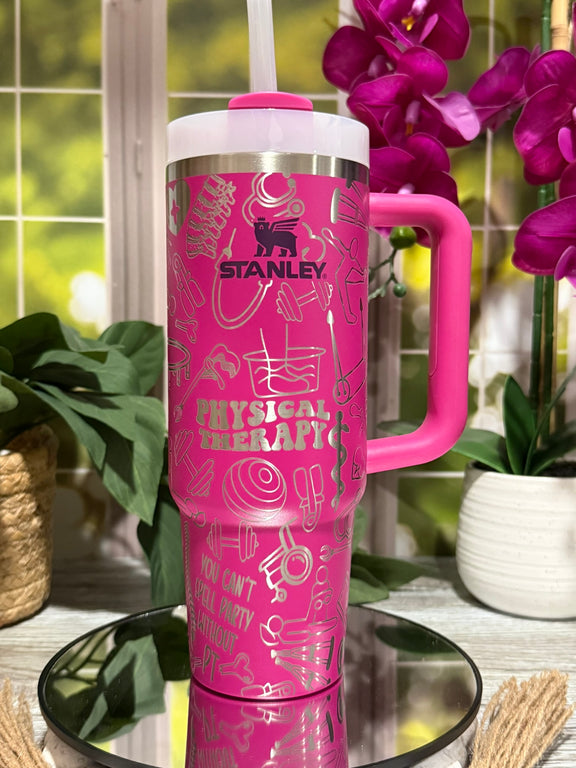 30oz Stanley Fuchsia tumbler cup with handle, laser engraved with Physical Therapy design including PT icons and phrase “You can’t spell party without PT” – ready to ship.