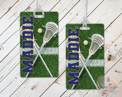Lacrosse-themed bag tags with name and team colors shown on wood background