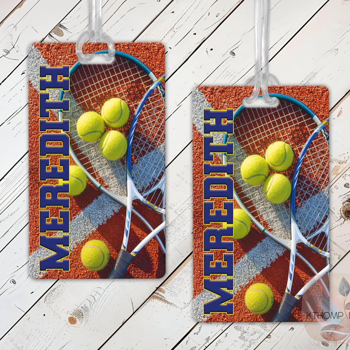Tennis-themed sports bag tags with player's name on a wood background