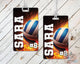 Custom volleyball bag tags with name and jersey number on a wood background
